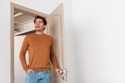man walking through door in home during final walkthrough