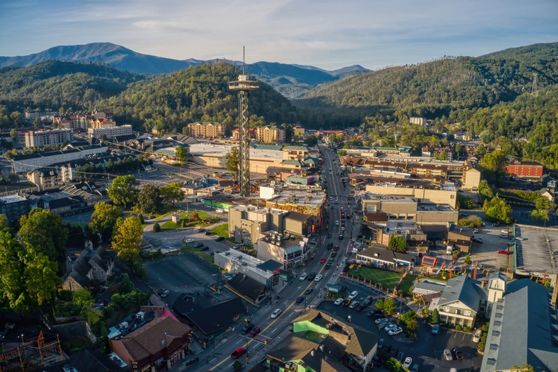 aerial view of downtown Gatlinburg with Smoky Mountains in background