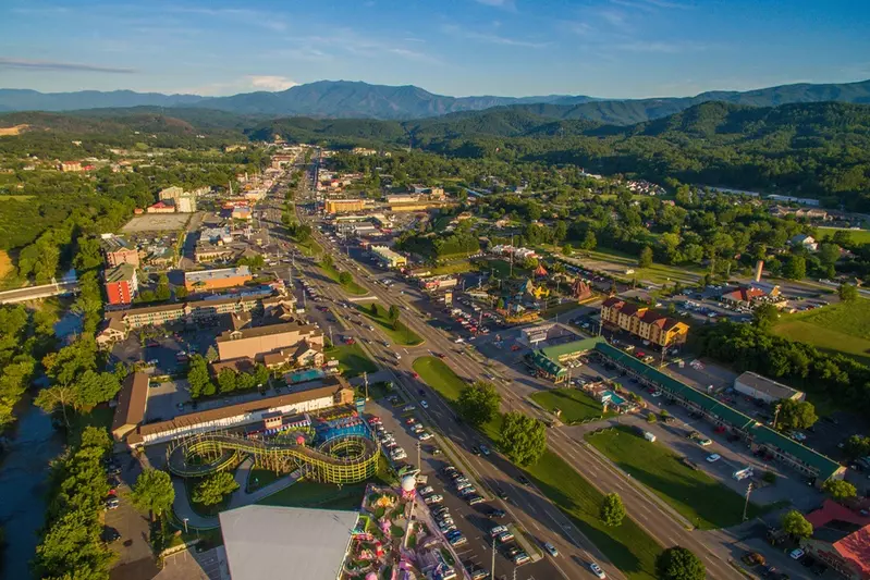 aerial view of the Pigeon Forge Parkway with Great Smoky Mountains in the background