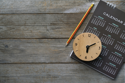 clock on top of calendar