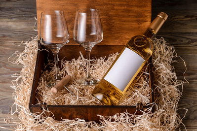 box with bottle of wine and two glasses